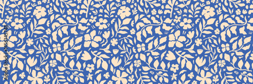 Obraz na płótnie Seamless botanical pattern with hand-drawn floral and leaf shapes in beige on a vibrant blue background. Perfect for fabric, wallpaper, wrapping paper, and modern surface design projects. w salonie
