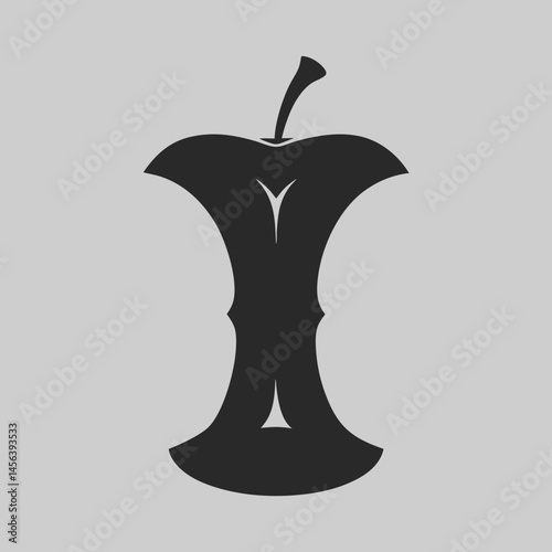 A stark black apple core graphic minimalist design representing waste consumption or the end of something simple bold