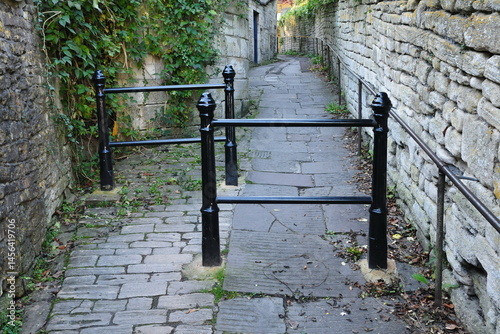 Narrow alleyway with a cycle chicane 
