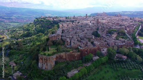 Orvieto, Umbria, Italy: Panoramic view of town nestled in hills.