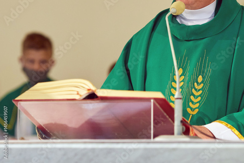 Fényképezés Close-up of Priest’s Vestments During Catholic Mass Ceremony