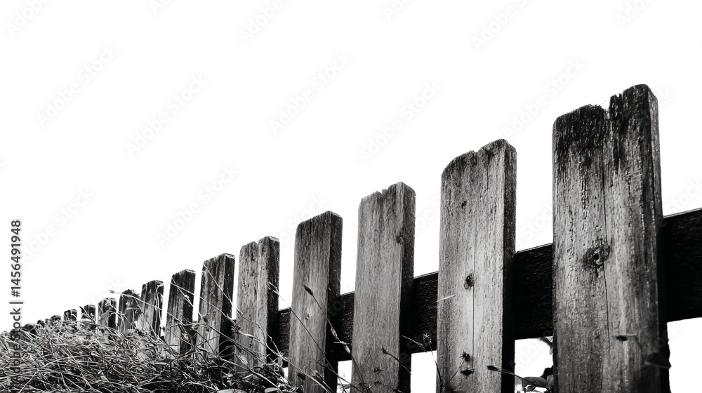 Obraz premium a black and white photo of a wooden fence