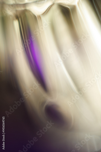 Abstract Flowing Purple and Light Gradient Background