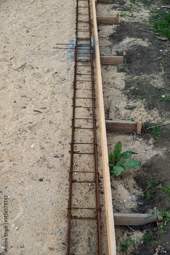 Close-up construction to reinforce foundation ready to pour concrete