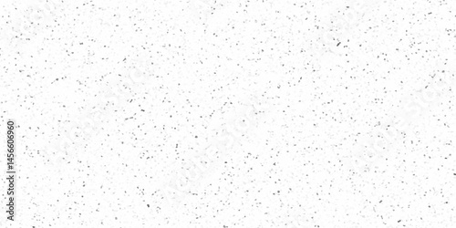 Terrazzo background with scattered gray and black dots. Rock spatter stone marble backdrop. White wall texture with noise overlay pattern. Vintage quartz terrazzo flooring.
