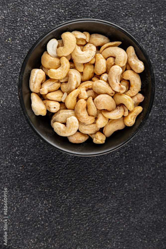 Cashew nuts natural superfood natural food vegetables dish organic product fresh tasty gourmet food background on the table rustic food top view copy space keto and paleo diet vegetarian vegan food Cashew nuts natural superfood natural food vegetables dish organic product fresh tasty gourmet food background on the table rustic food top view copy space keto and paleo diet vegetarian vegan food