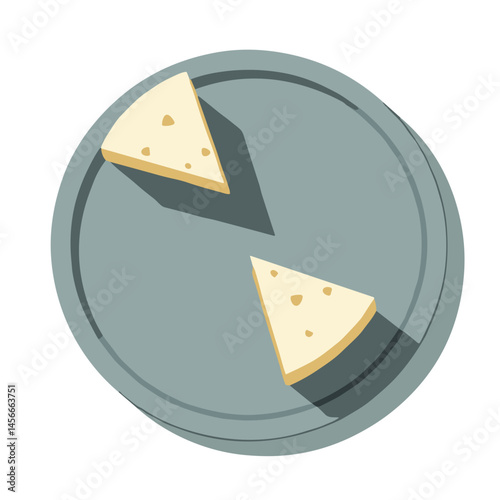 Two triangular pieces of cheese on gray plate isolated