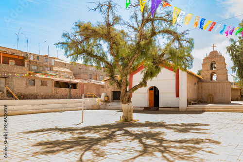 Main church, rustic houses and Plaza of Ayquina, a little village in the middle of the Atacama desert in northern Chile.