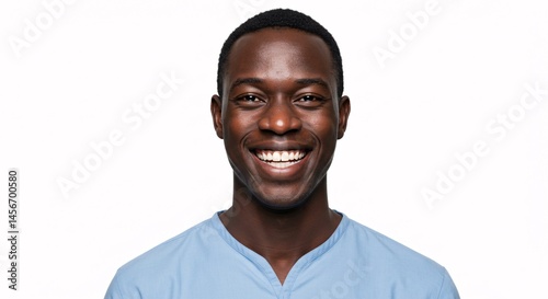 Radiant smile of a young african american professional on a white background