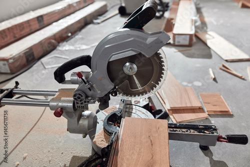 Circular saw for cutting laminate hardwood floor.