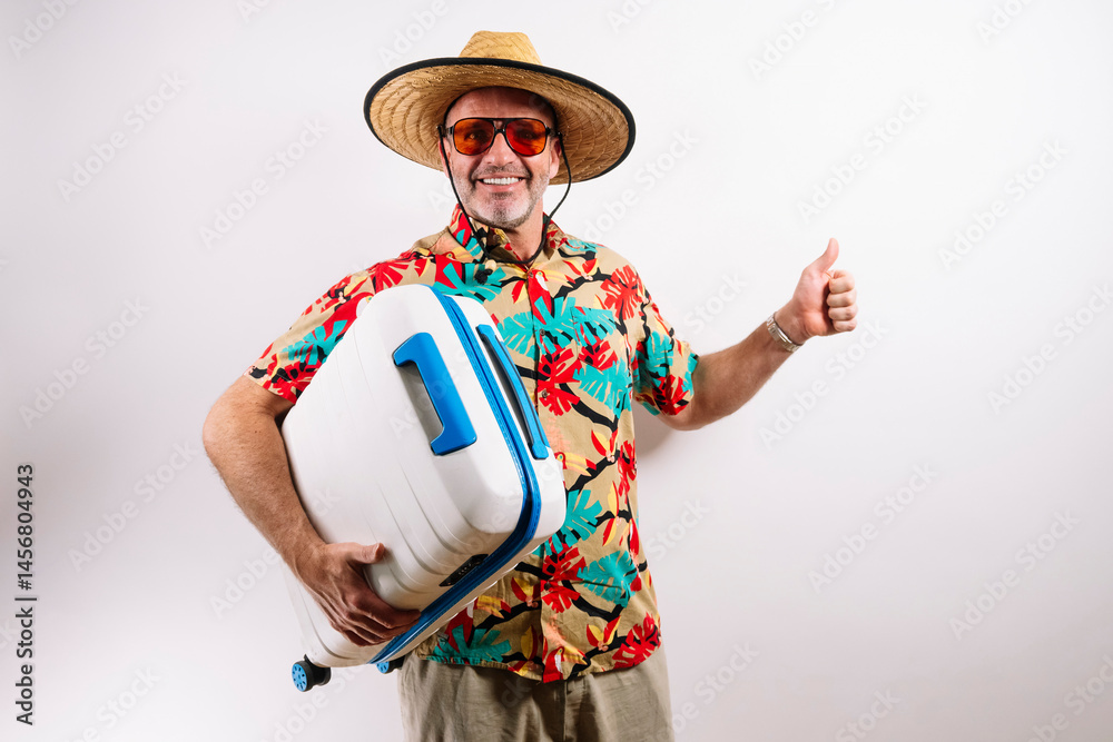 Man holding suitcase, cheerful and relaxed expression