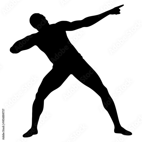 Silhouette of athletic man in dynamic celebratory pose pointing upward