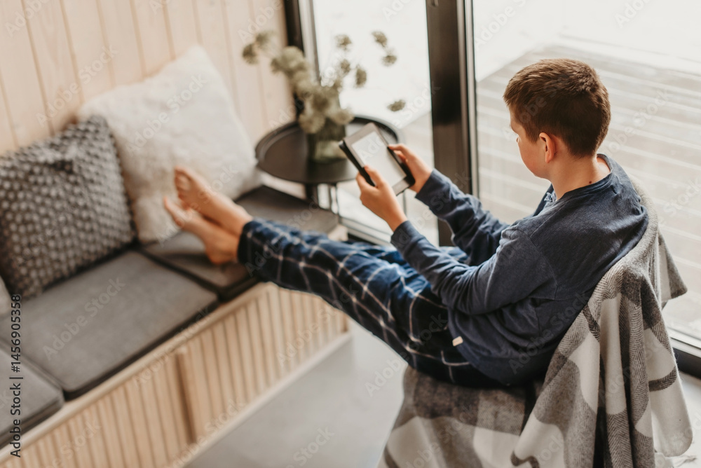 Teenager Kid Reading Book in Log Cabin
