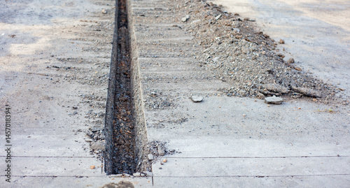 Drilling and repairing the road. Asphalt road is drilled with a road drill. Transportation-travel-transportation.