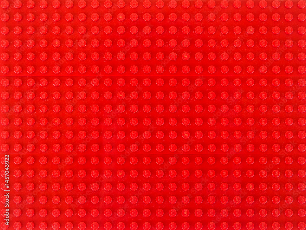 Fototapeta premium Fondo rojo de placa base de LEGO