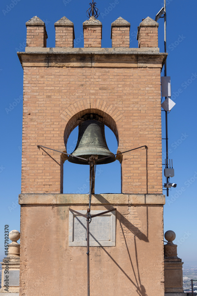 Historic bell on top of Watch Tower (Torre de la Vela) of Alcazaba fortress of Alhambra, Granada, Spain, Andalusia