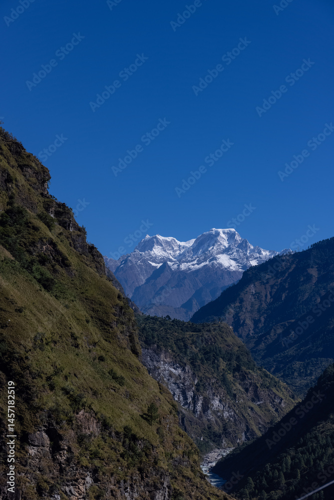 Fototapeta premium Landscape of Himalaya, Panoramic view of Himalayan mountain covered with snow. Himalaya mountain landscape in winter at Kedarnath valley.