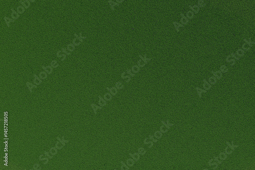 Close-up of green felt surface texture
