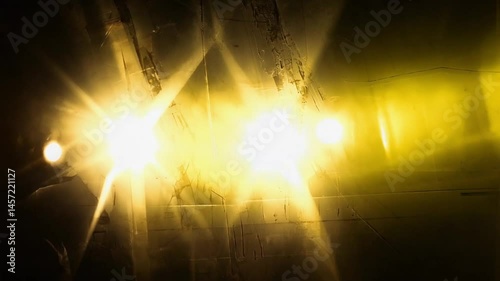 Dynamic film reel rapidly yellow orange solar flares bursting, overexposed film strips golden leaks, retro lens bloom burnt film edges, heavy grain jitter shake vintage reel countdown flickers 4K