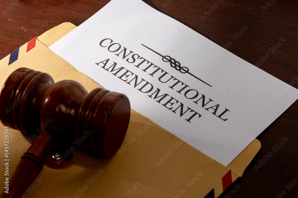 Formal Constitution Amendment Paper with Gavel on Office Table Formal Constitution Amendment Paper with Gavel on Office Table