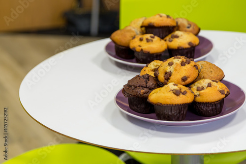 Chocolate Chip Muffins In The Workplace Breakroom. Sweet office perks. Boosting team morale.