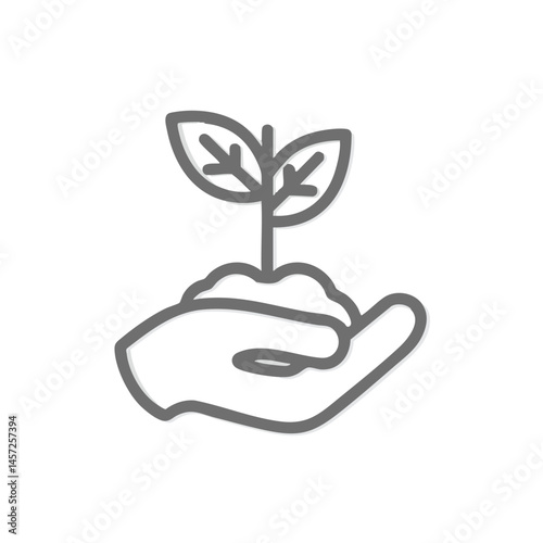 Hand nurturing a seedling to grow