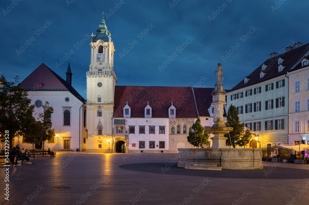 Bratislava, Slovakia. View of Hlavne namestie square and old Town Hall at dusk