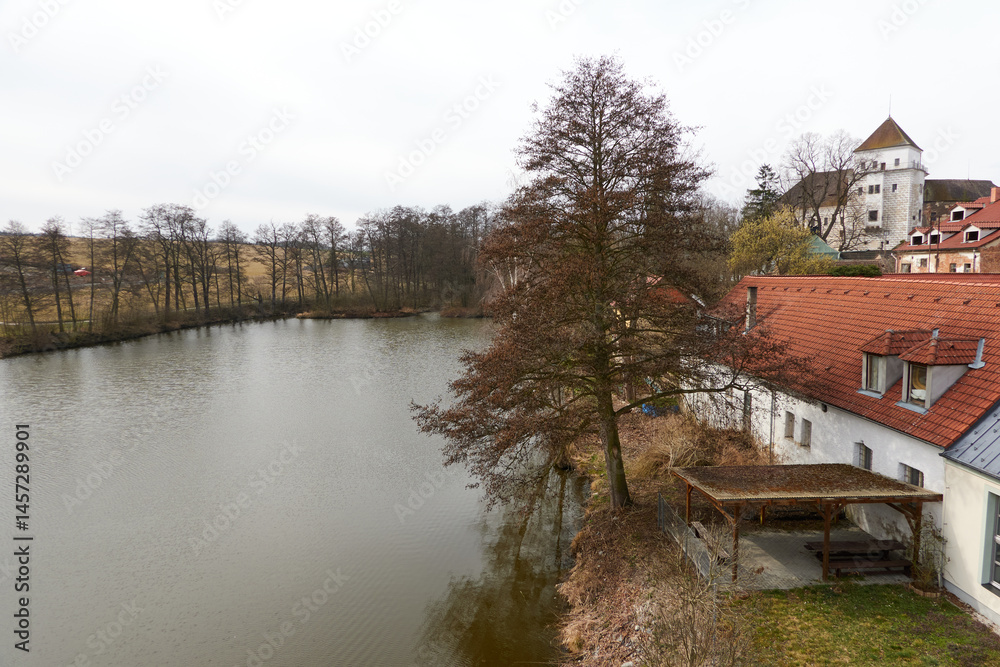 Rozmital pod Tremsinem, Czech Republic - March 22, 2025 - the Rozmital Chateau, original mud castle dates back to the mid-13th century on a sunny spring day.