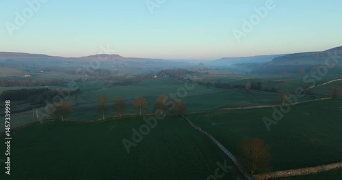 Sunrise over misty Wensleydale in Yorkshire Dales