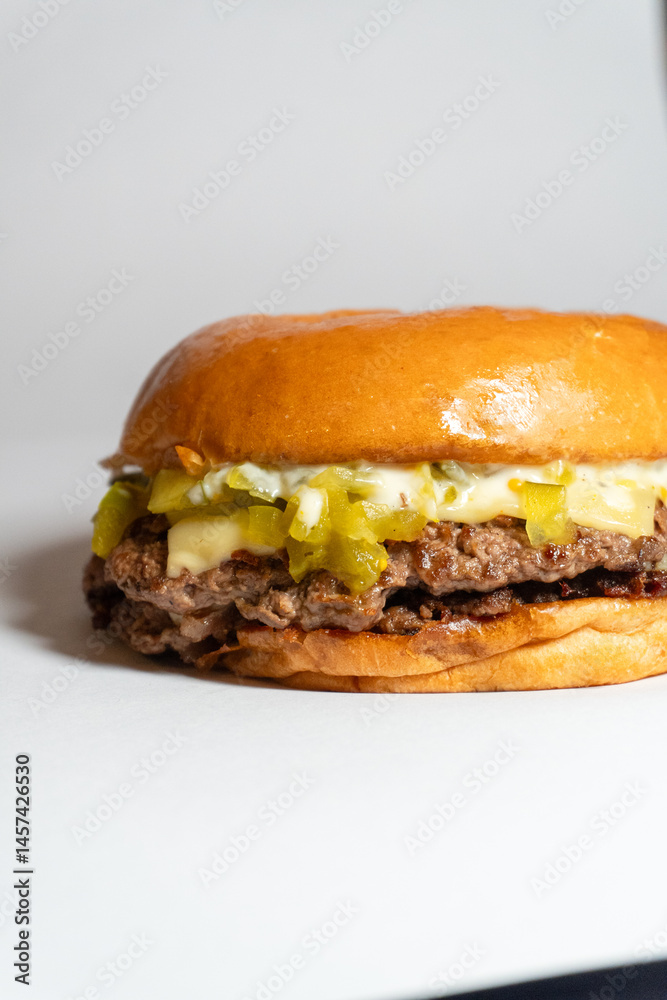 hamburger on a white background, with pickle and trouffle hamburger on a white background, with pickle and trouffle