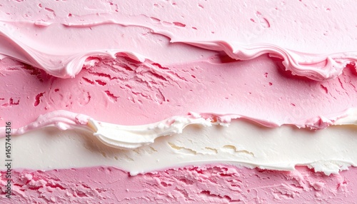 Swirls of strawberry and vanilla ice cream create a vibrant, textured close-up perfect for summer treats and celebratory desserts.