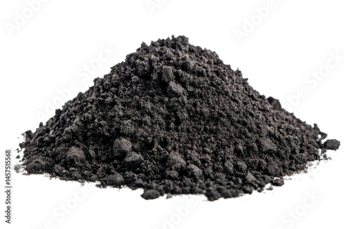 A mound of dark granular material against a black background creating a simple still life image composition