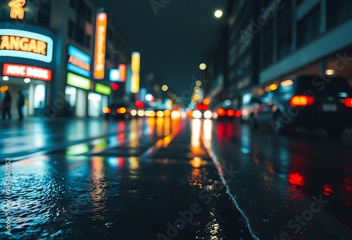 city street at night with cars and neon signs