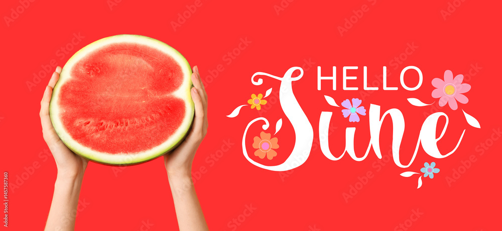 Fototapeta premium Female hands with half of sweet watermelon on red background