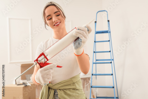 Young woman with sealant in...