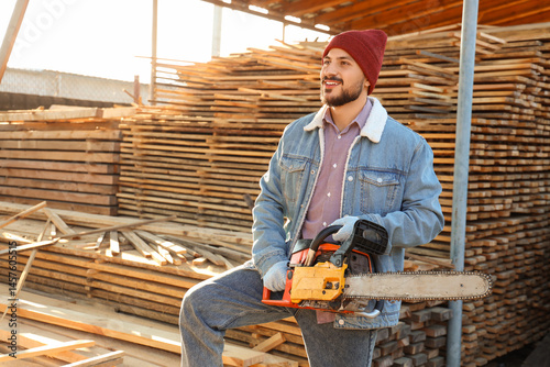 Handsome carpenter with ele...