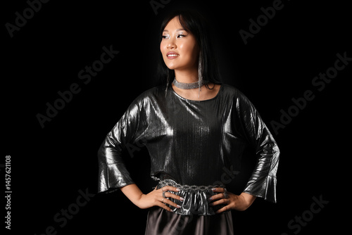 Beautiful Asian woman in si...