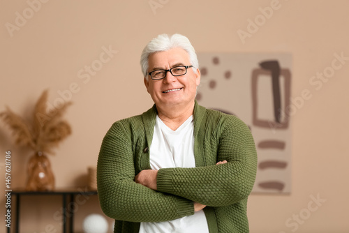 Happy senior man in living ...