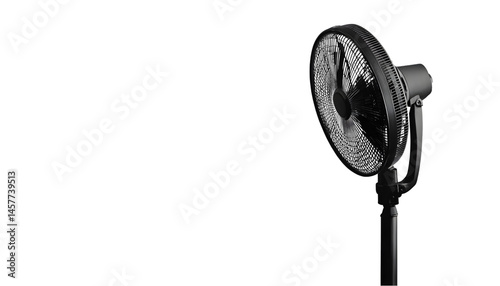 Modern, black, stand fan against dark background.  Powerful airflow for cool air