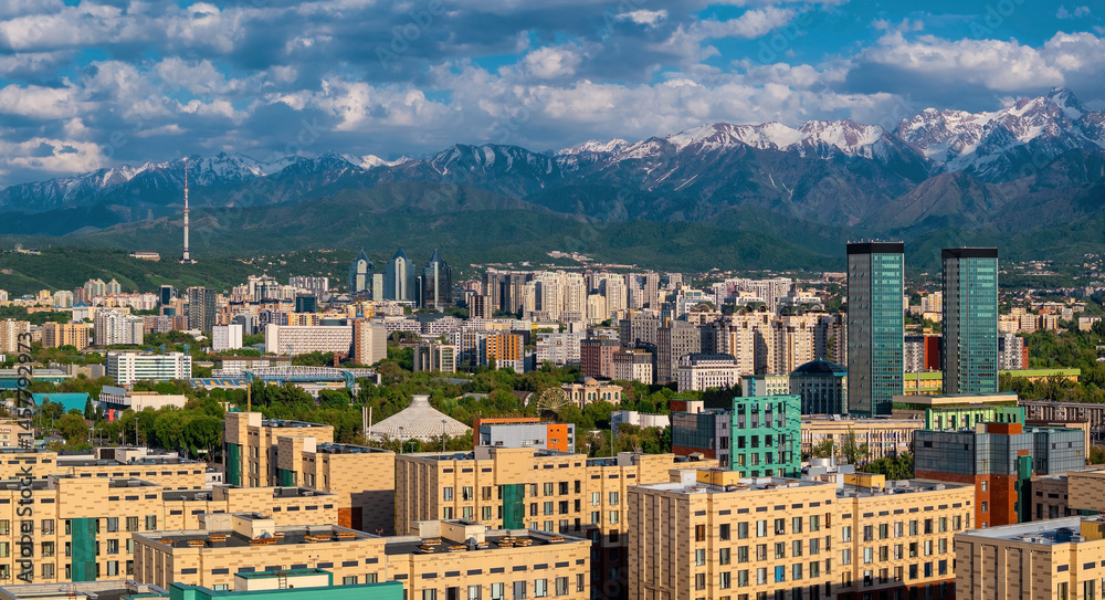 Naklejka premium View from a quadcopter of the central part of the Kazakh city of Almaty on a spring day