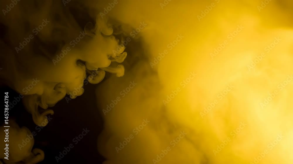 Colored middle size smoke explosion with trails,explodes on camera.Smoke density low.Separated on pure black background, abstract background, contains alpha channel.yellow smoke, swirling golden mist,