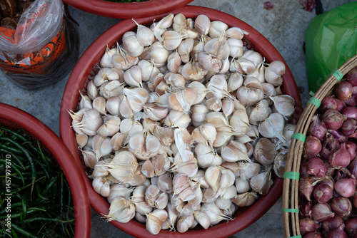 Onions in baskets are sold in traditional market

