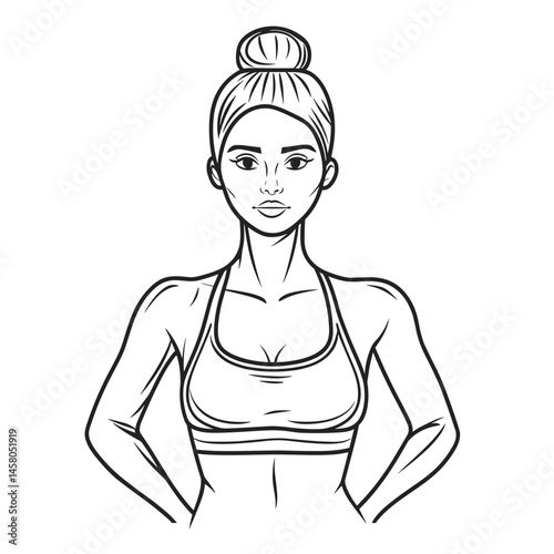 Young woman posing confidently in fitness attire with a bun hairstyle  