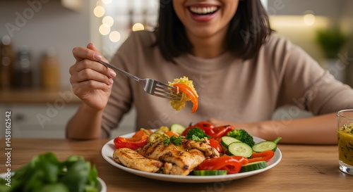 Healthy Plate: Woman Enjoying a Nutritious Meal at Home