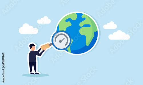 Businessman holding magnifying glass observing globe illustrating global business trend analysis and evaluation