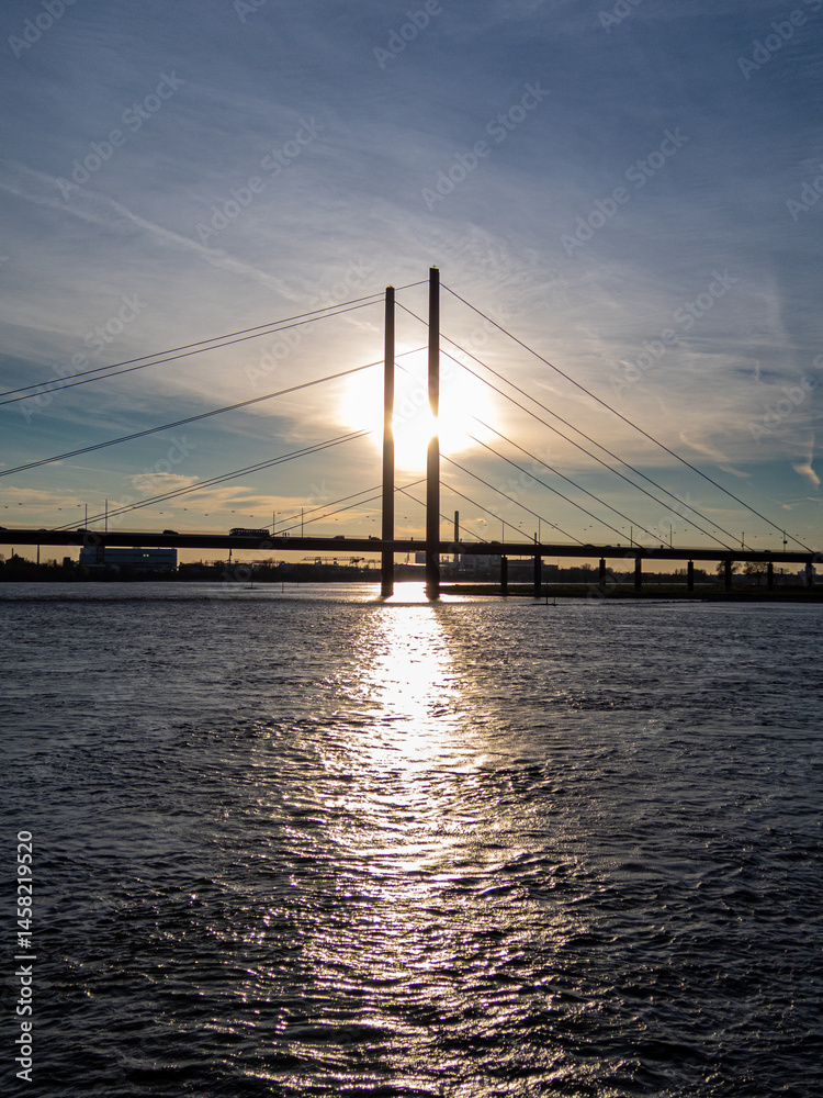 Bridge on Rhine with interesting sky on sunset