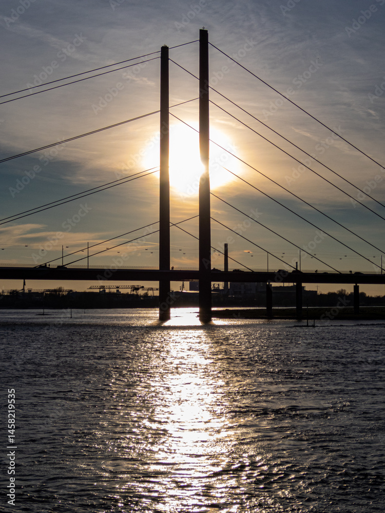 Bridge on Rhine with interesting sky on sunset