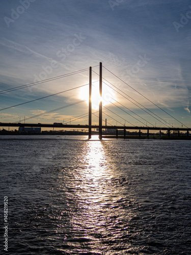 Obraz na płótnie Bridge on Rhine with interesting sky on sunset w salonie