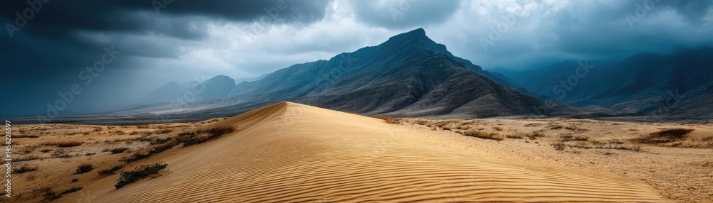 Panorama sand storm over huge dune with powerful wind wave concept. Expansive desert landscape with mountains under dramatic skies.