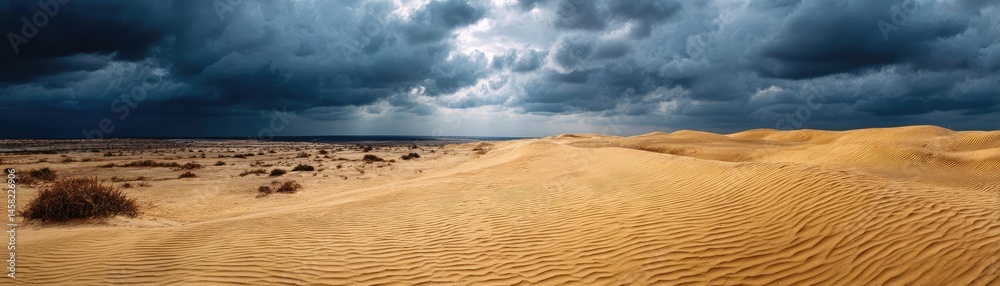 Panorama sand storm over huge dune with powerful wind wave concept. Desert landscape with dramatic clouds and golden sand dunes.